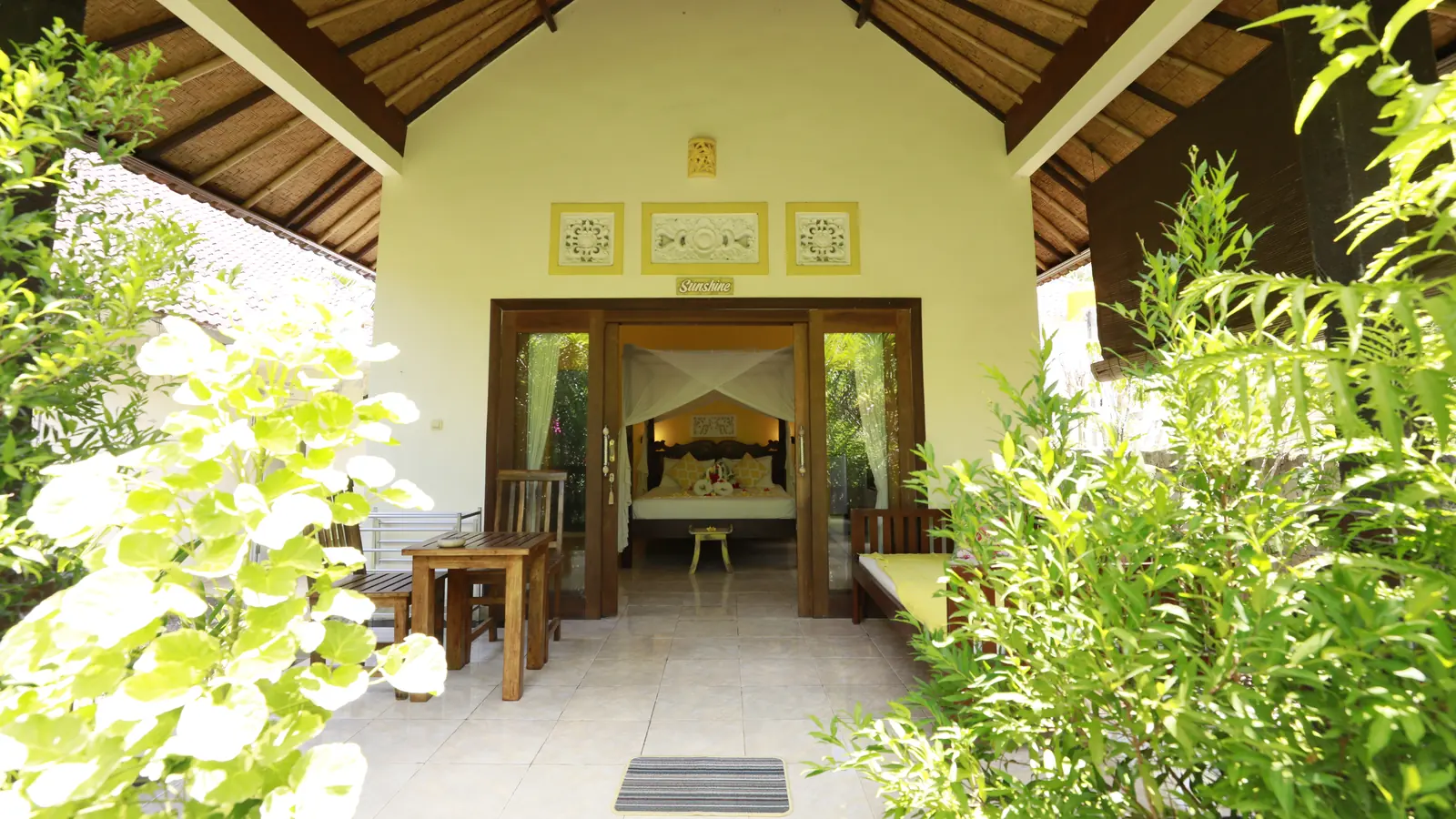 Front of a Kirana bungalow with garden plants